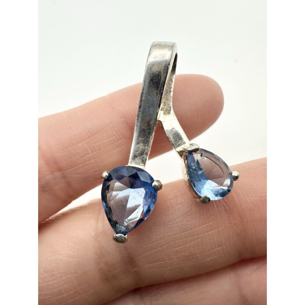 Silver Tone Trillion Cut Blue Stone Pendant
